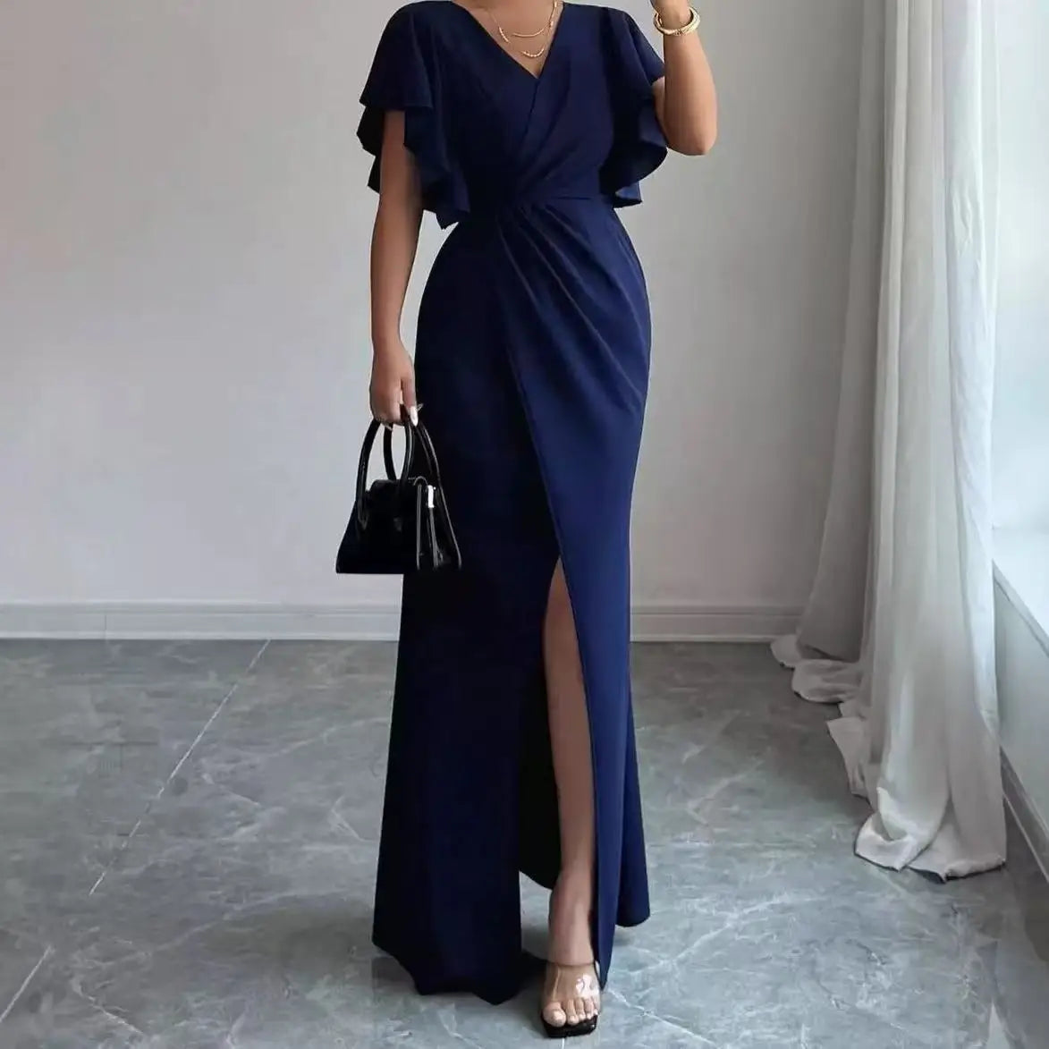 Vestido Largo Elegante con Manga Volante y Escote V – Corte Sirena 2026