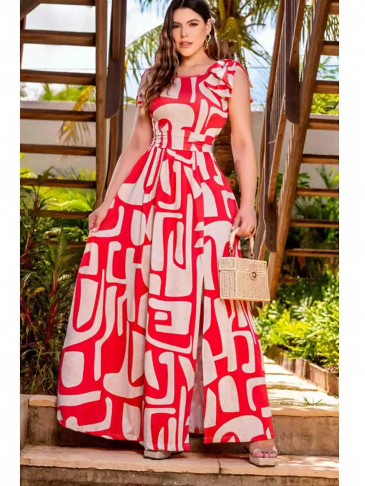 Plus size red and white geometric abstract print sleeveless maxi dress; single side bow waist cinching side slit flared hem vacation maxi dress